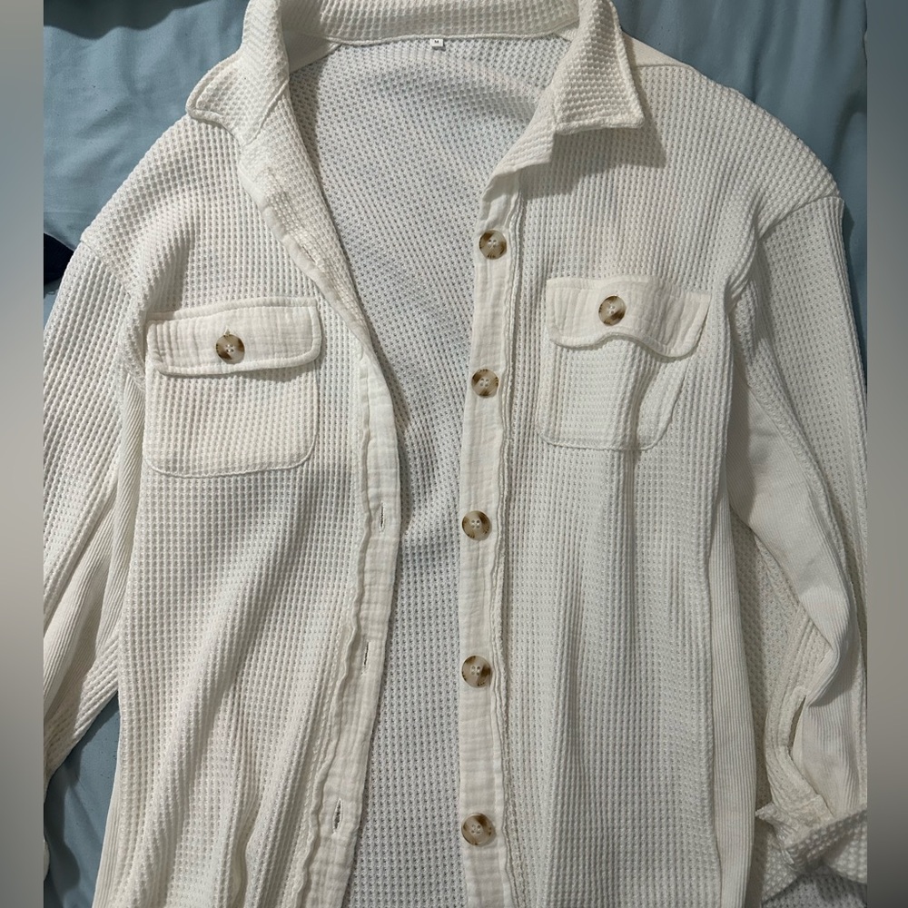 White knitted sweater